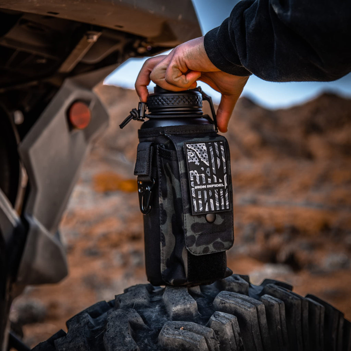 Iron Infidel Battle Bottle - Half Gallon Insulated Water Bottle with Paracord Handle, Large 64 oz Stainless Steel Water Jug with Rugged, Removable Sleeve for Keys, Wallet, & Phone (Live Free 2 Liter)
