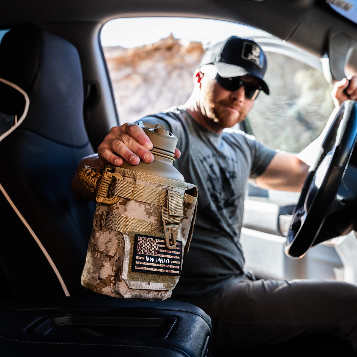 Iron Infidel Battle Bottle - Half Gallon Insulated Water Bottle with Paracord Handle, Large 64 oz Stainless Steel Water Jug with Rugged, Removable Sleeve for Keys, Wallet, & Phone (Live Free 2 Liter)